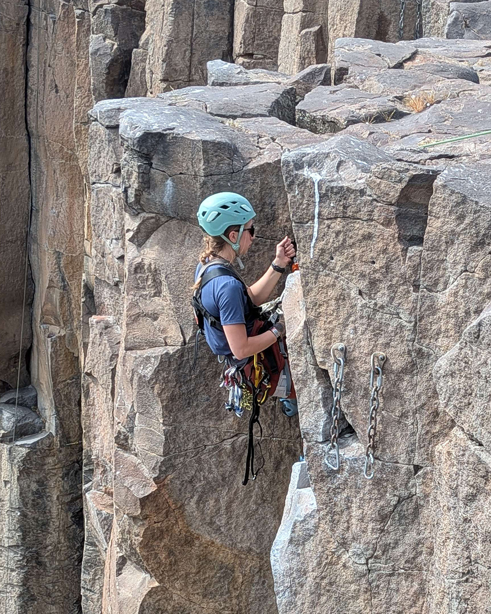 Rock climbing photographer rappeling